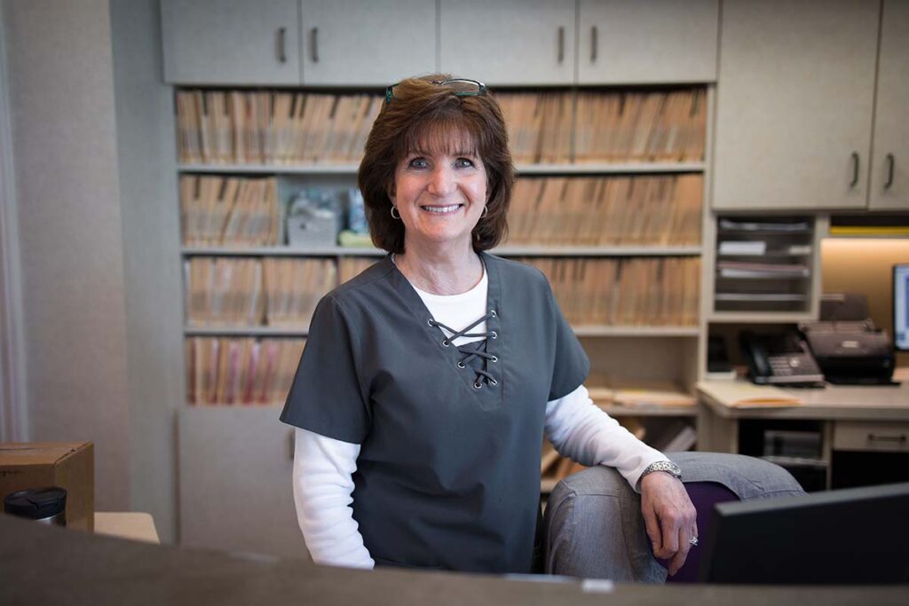 Rose-at-the-front-desk-of-Kelleher-Orthodontics-serving-cameron-park