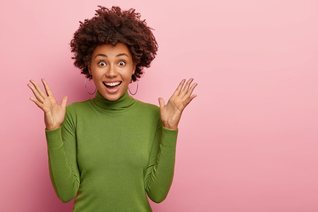 Woman so happy to be pain free after TMJ Treatment Woman so happy to be pain free after TMJ Treatment from the doctor or orthodontist