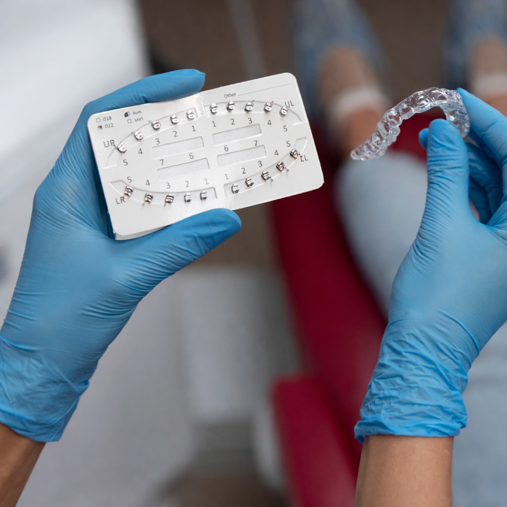 Friendly team at Kelleher Orthodontics providing a personalized Invisalign treatment consultation.